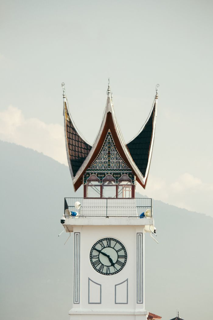 Discover the architectural beauty of the Jam Gadang clock tower in Bukittinggi, Indonesia.
